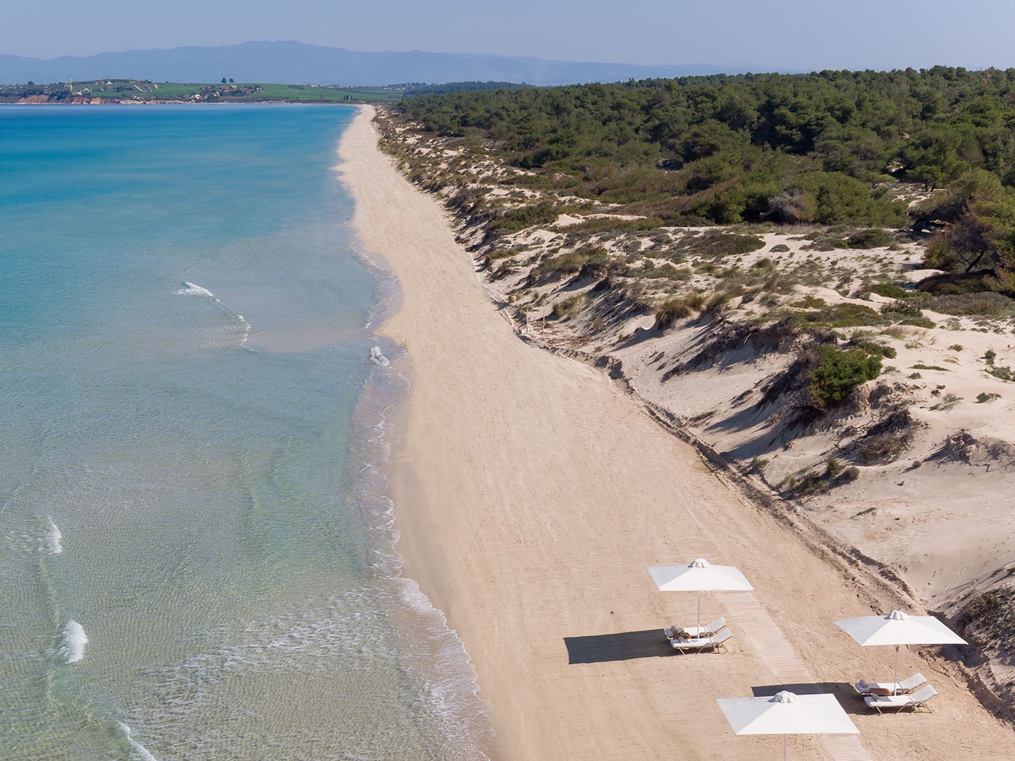 This epic Greek resort has become the stress-free summertime ritual for smart families